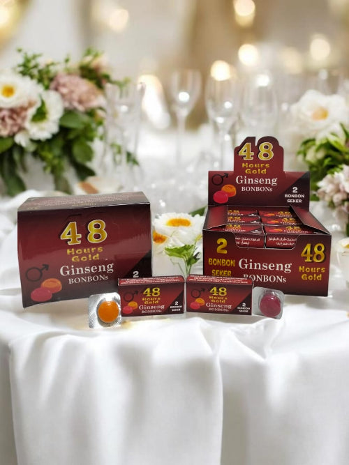 A set of Bonbons 48 Hours Gold Ginseng candy packages arranged on a white draped table with blurred flowers and glasses in the background.